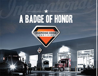 Picture of an International® truck warehouse with a Diamond Edge Certified logo.