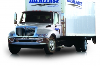 White International® box truck with Idealease on the side.