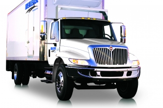 White International® box truck with Idealease on the side.